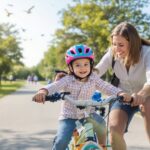 como enseñar a montar en bici